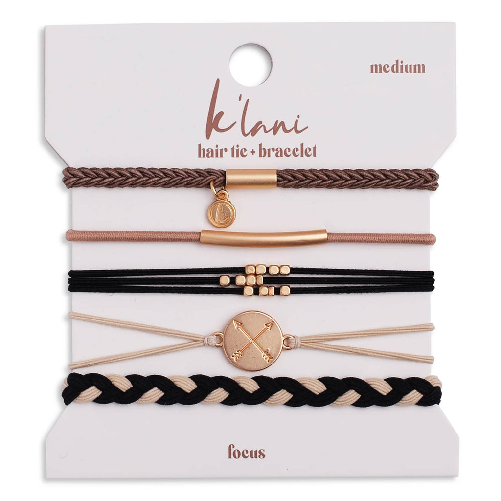 Set of hair ties and bracelets on a 'klani' branded card with 'focus' text.