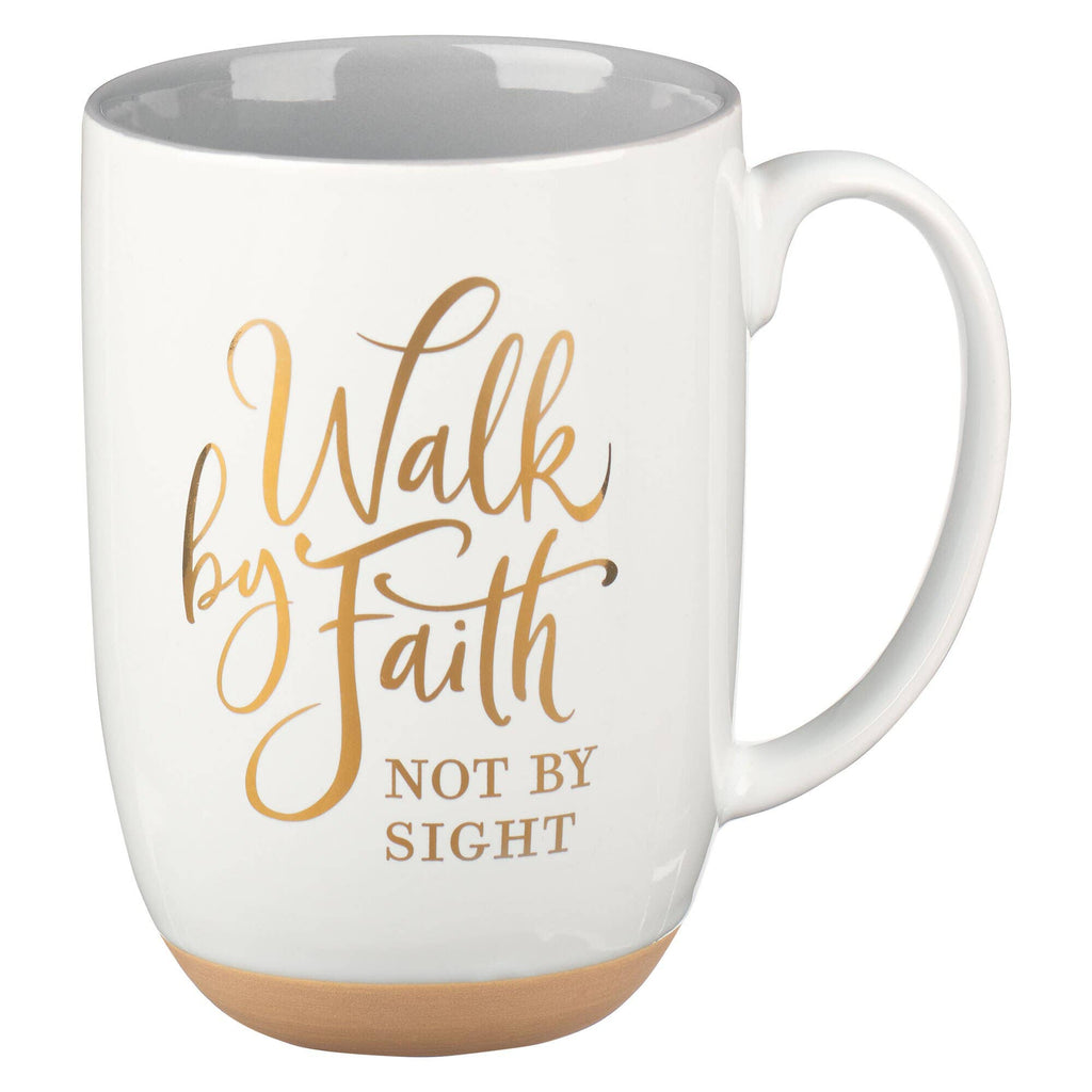 White mug with gold text 'Walk by Faith Not by Sight' on a white background